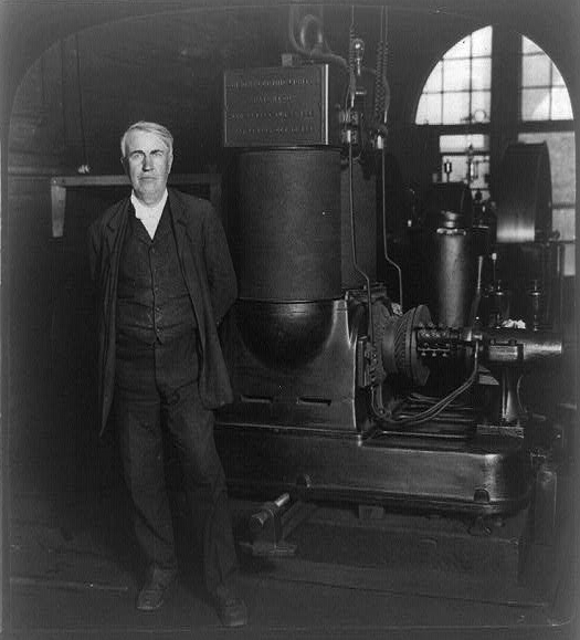 Thomas Edison and his original dynamo, Edison Works, Orange, N.J., U.S.A.