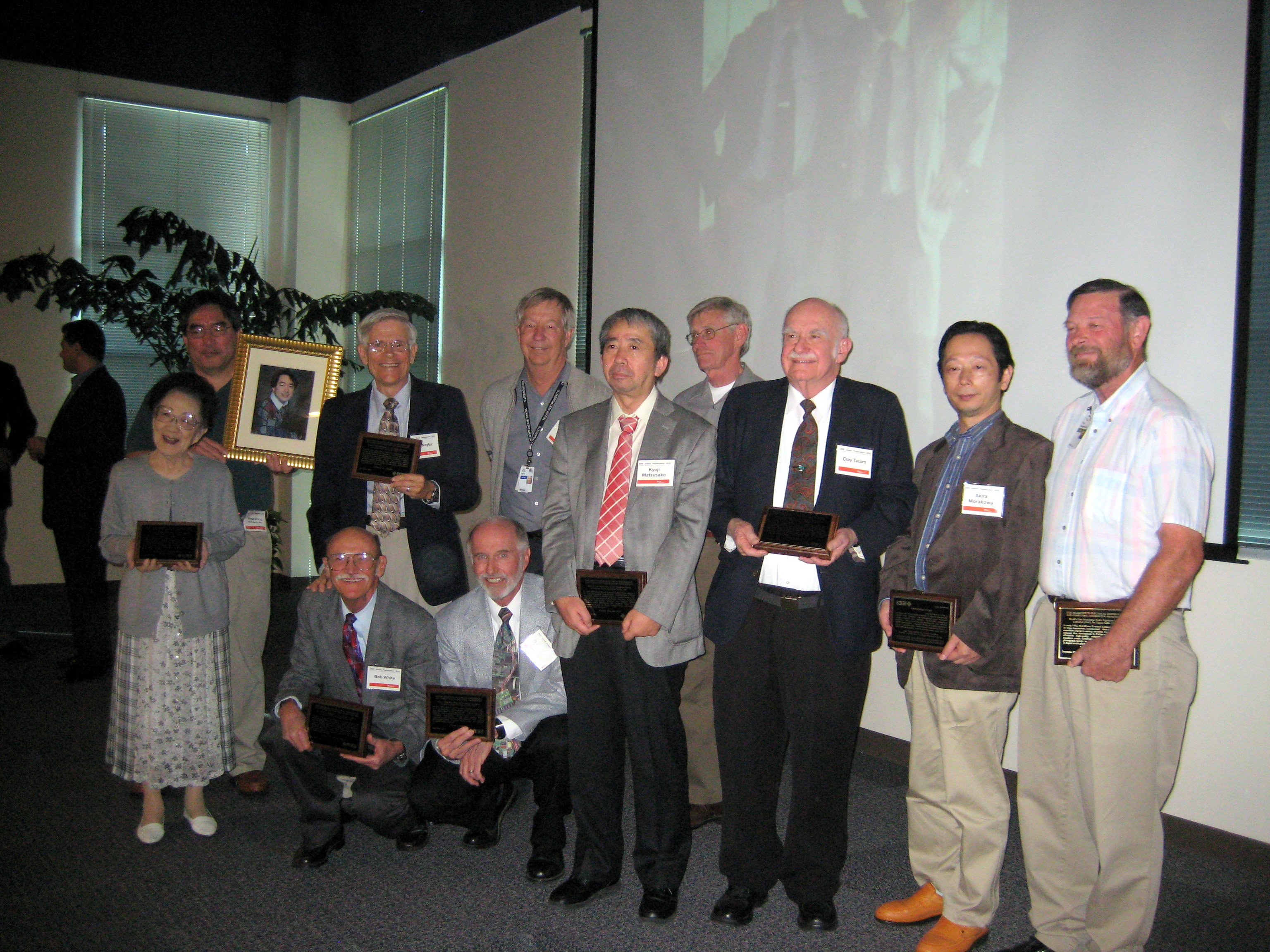 Honorees at DAC Milestone ceremony, 6 December 2010. Photo copyrightL Linda Prazak