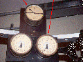 Figure 8.11 Synchroscope (left arrow) and Voltmeters (right arrow)