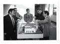 James V. Boone, center, with TRW team responsible for new Rancho Carmel TDRSS factory in California, U.S., c. 1982.