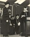 Weber with various men at Brooklyn Polytechnic ceremony