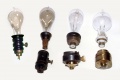 Photo credit: Richard Warren Lipack / Wikimedia Commons. The evolution of Edison's incandescent electric light bulb and socket - 1880-1881. Left to right: First form "1880 Wire Terminal Base" socket and bulb as used on the S.S. Columbia - first commercial installation of Edison electric lighting system; Second form "1880 Wire Terminal Base" socket and bulb; "1880 Original Screw Base" socket and bulb and the "1881 Improved Screw Base" socket and light bulb.